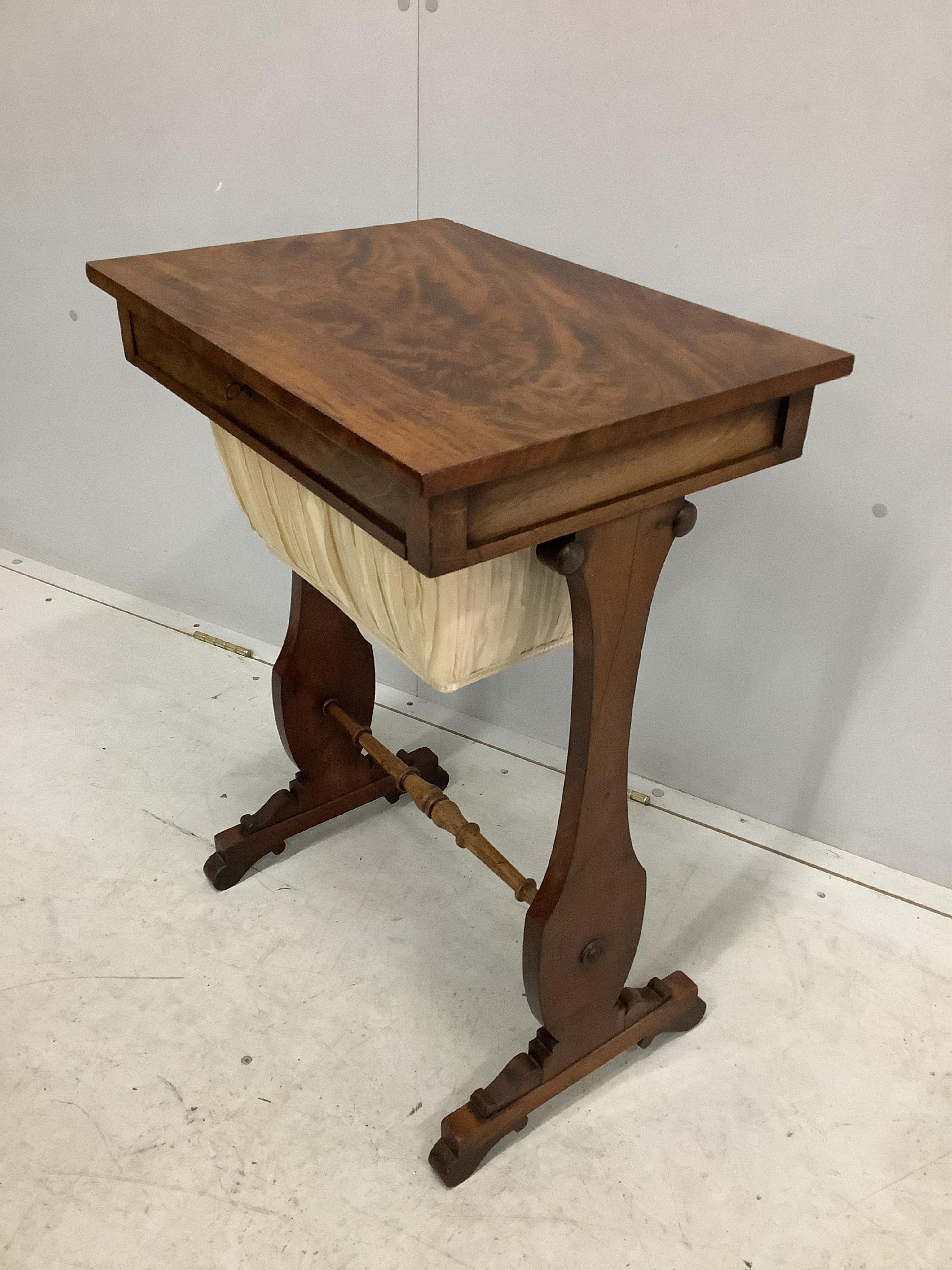 An early Victorian mahogany work table, width 54cm, height 72cm. Condition - good but for rubbing to the stretcher